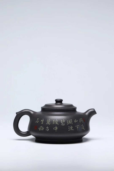 Purple clay teapot 7.4